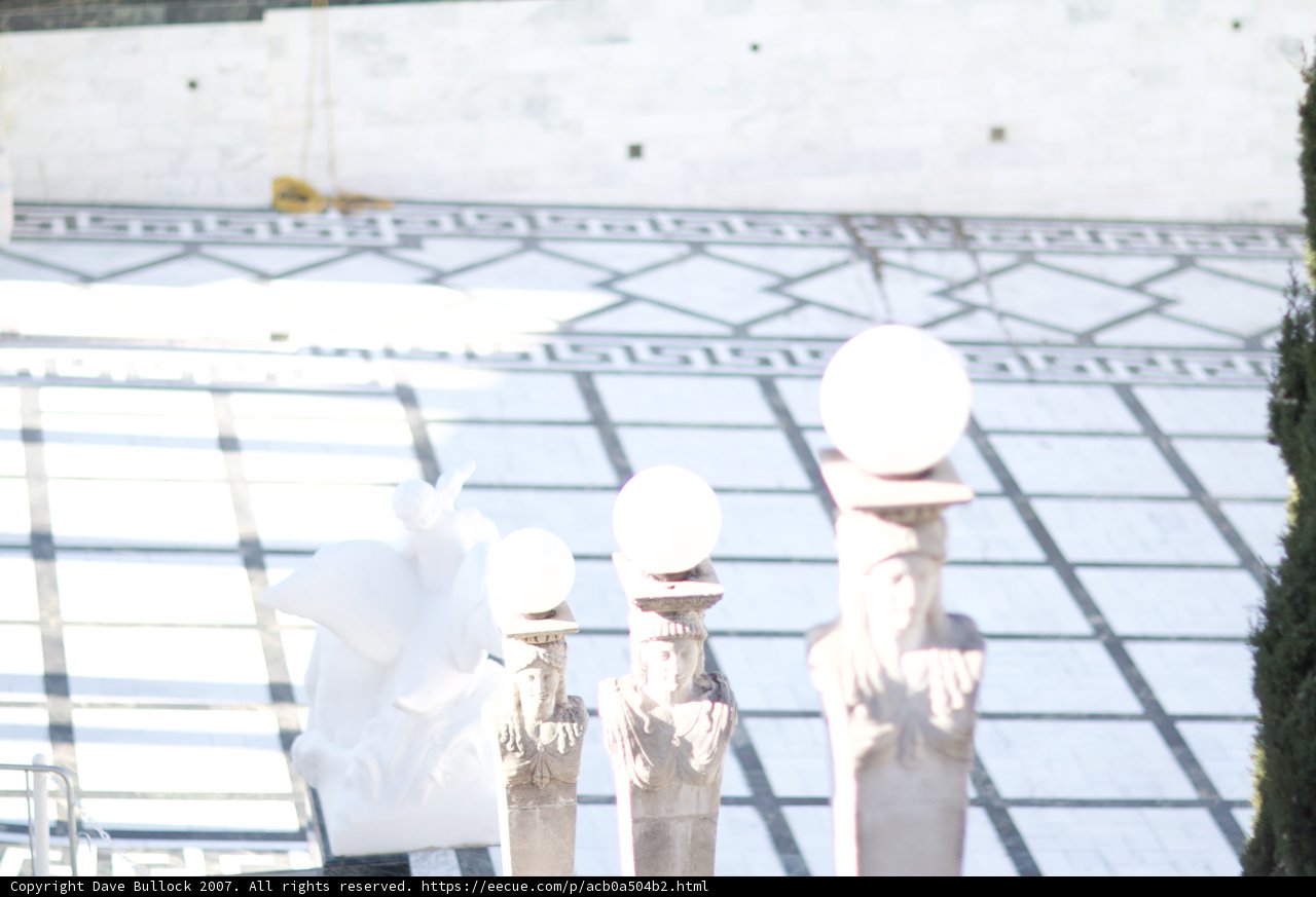 Praxiteles Statue on Walkway