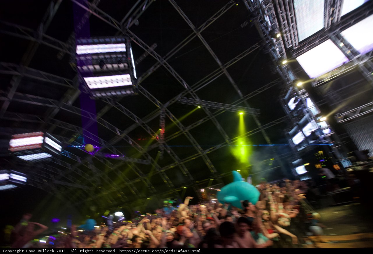 Electrifying Night Sky: A Sea of Faces at Coachella