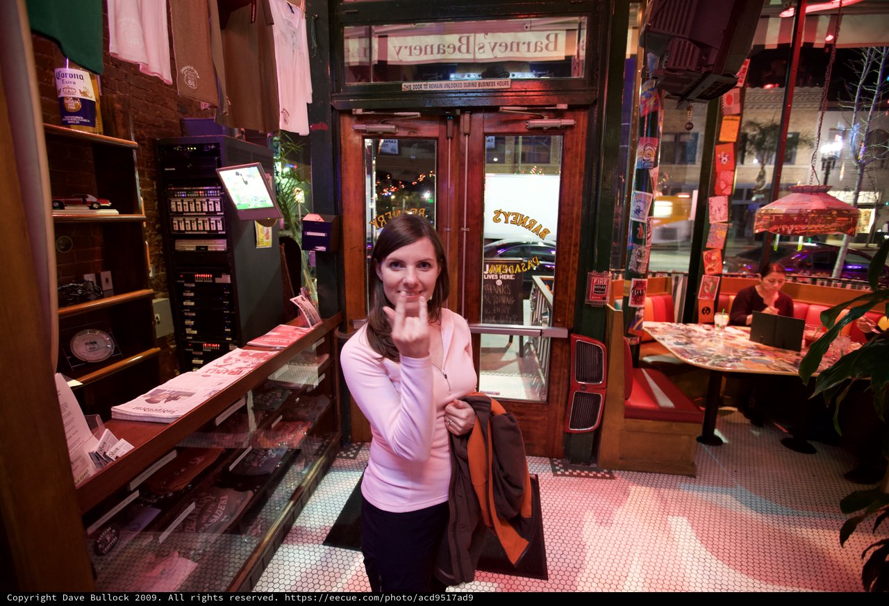 Woman Flips the Bird at Barney's Beanery Bar