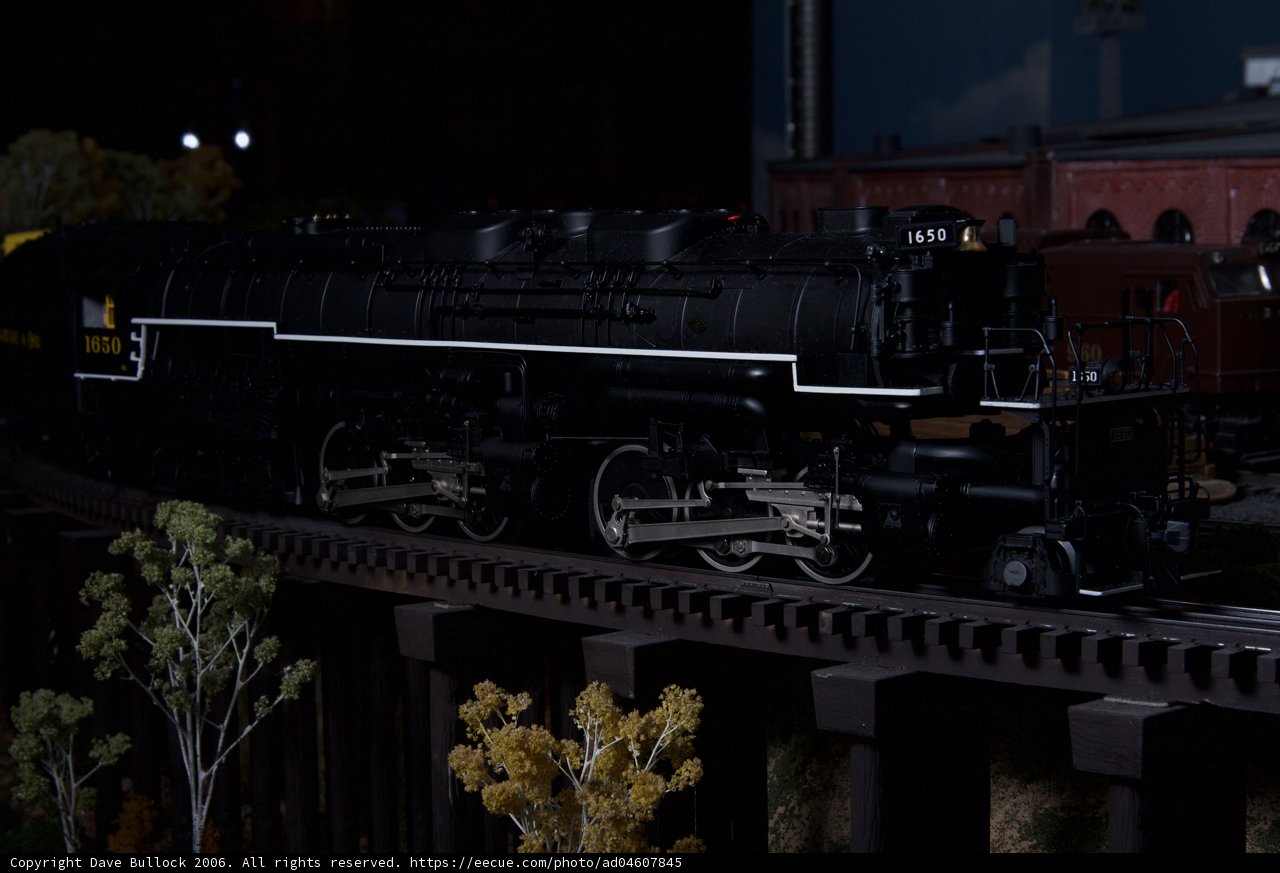 Vintage Locomotive Chugs through Forest