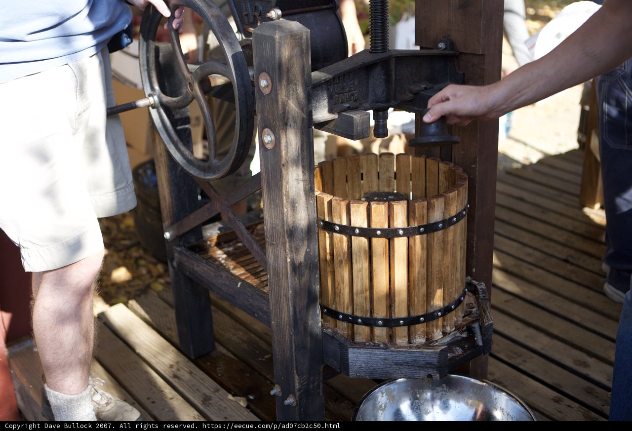 Crafting Homemade Wine in a Wooden Barrel