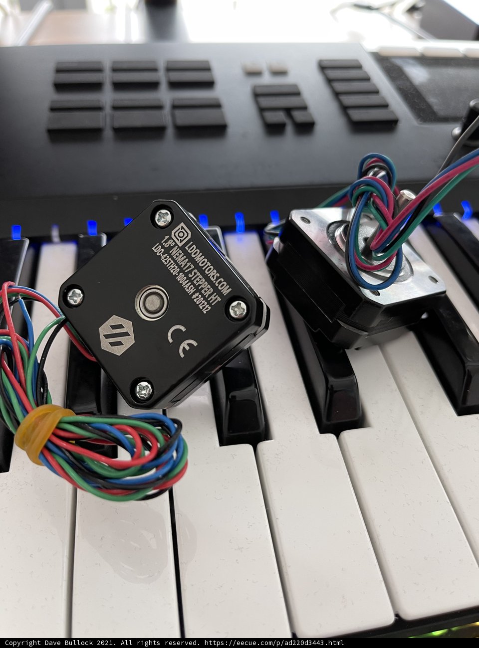 An Electronic Device Sitting on a Keyboard
