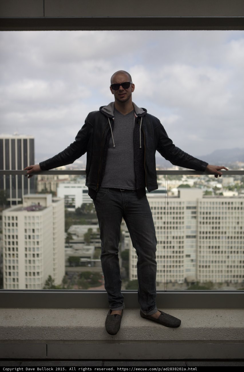 Arms Spread on the Rooftop
