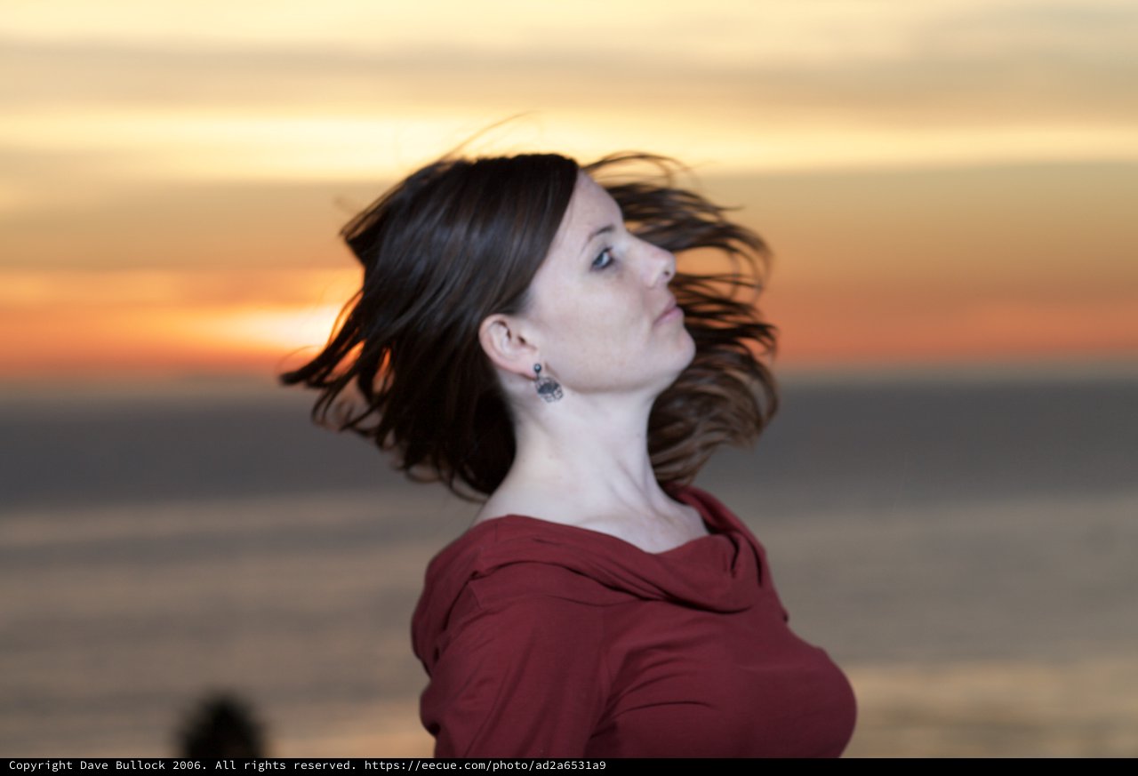 Woman in Red at Golden Hour Sunset Shore