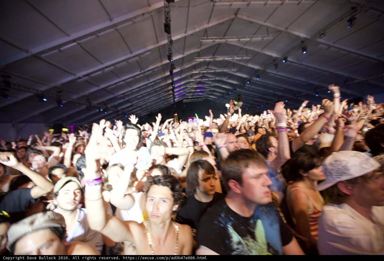 The Ultimate Coachella Experience Caption: The crowd goes wild as their favorite artist takes the stage, hands up in excitement and adorned with statement jewelry and trendy hats. #Coachella #Concert #Jewelry #Hat #Crowd #Fun
