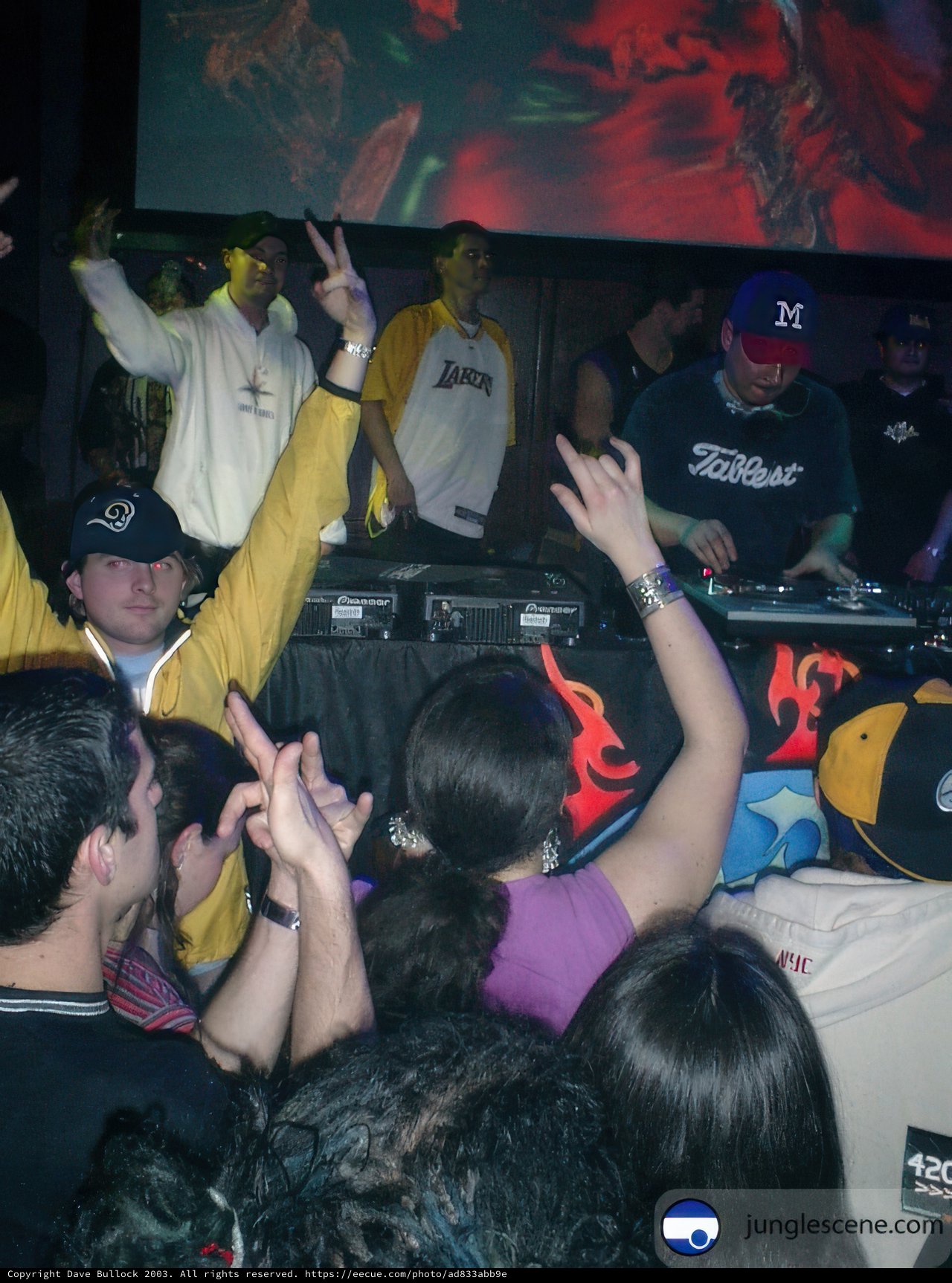 Crowd rocking out to old school beats