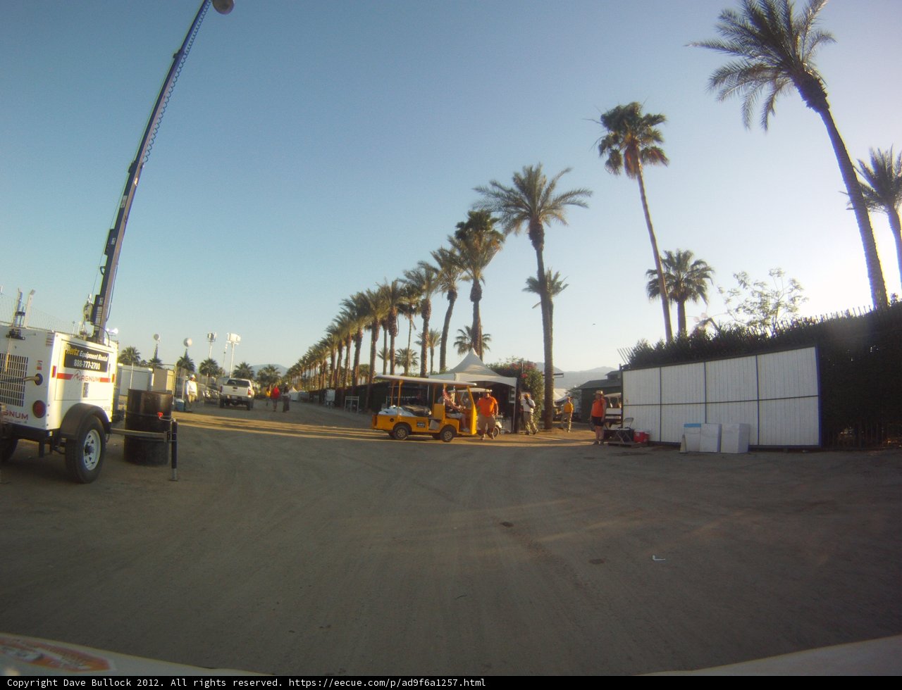 Palm-lined Street with a Truck
