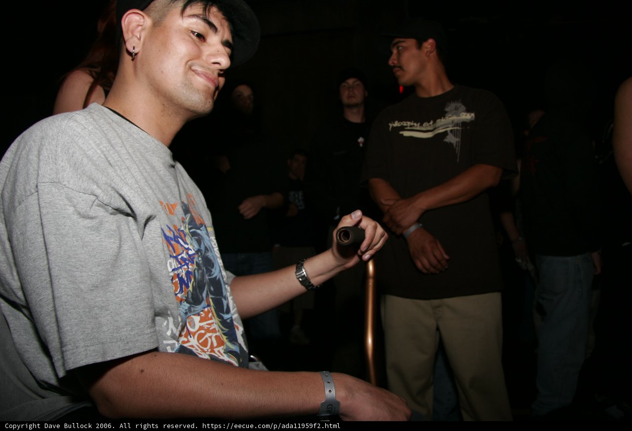 Gray T-Shirt and Tattooed Fingers