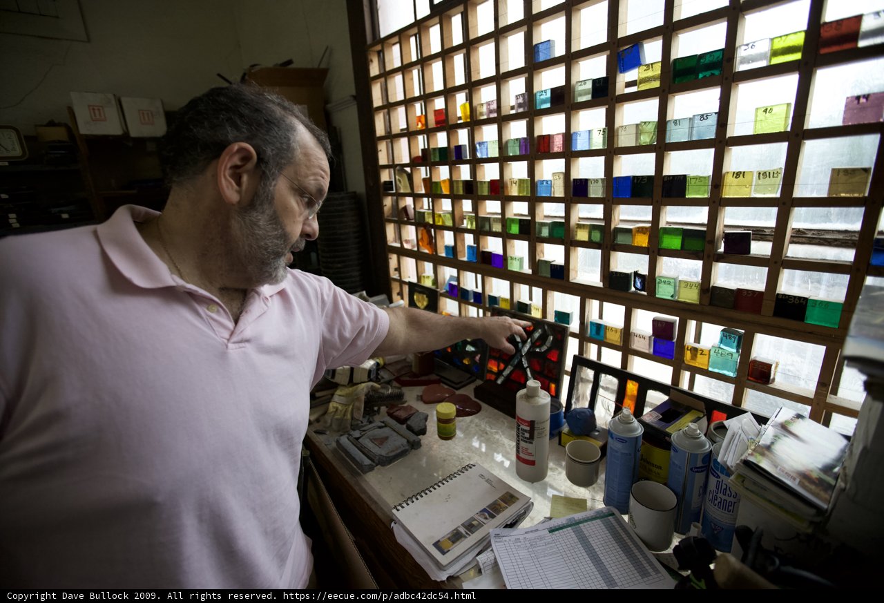 The Pink-Shirted Man Contemplates Stained Glass