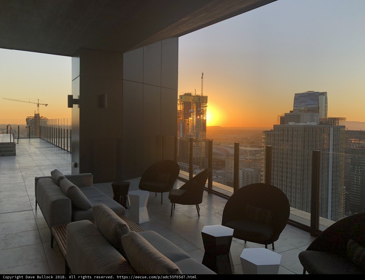 Rooftop Sunset Over Cityscapes