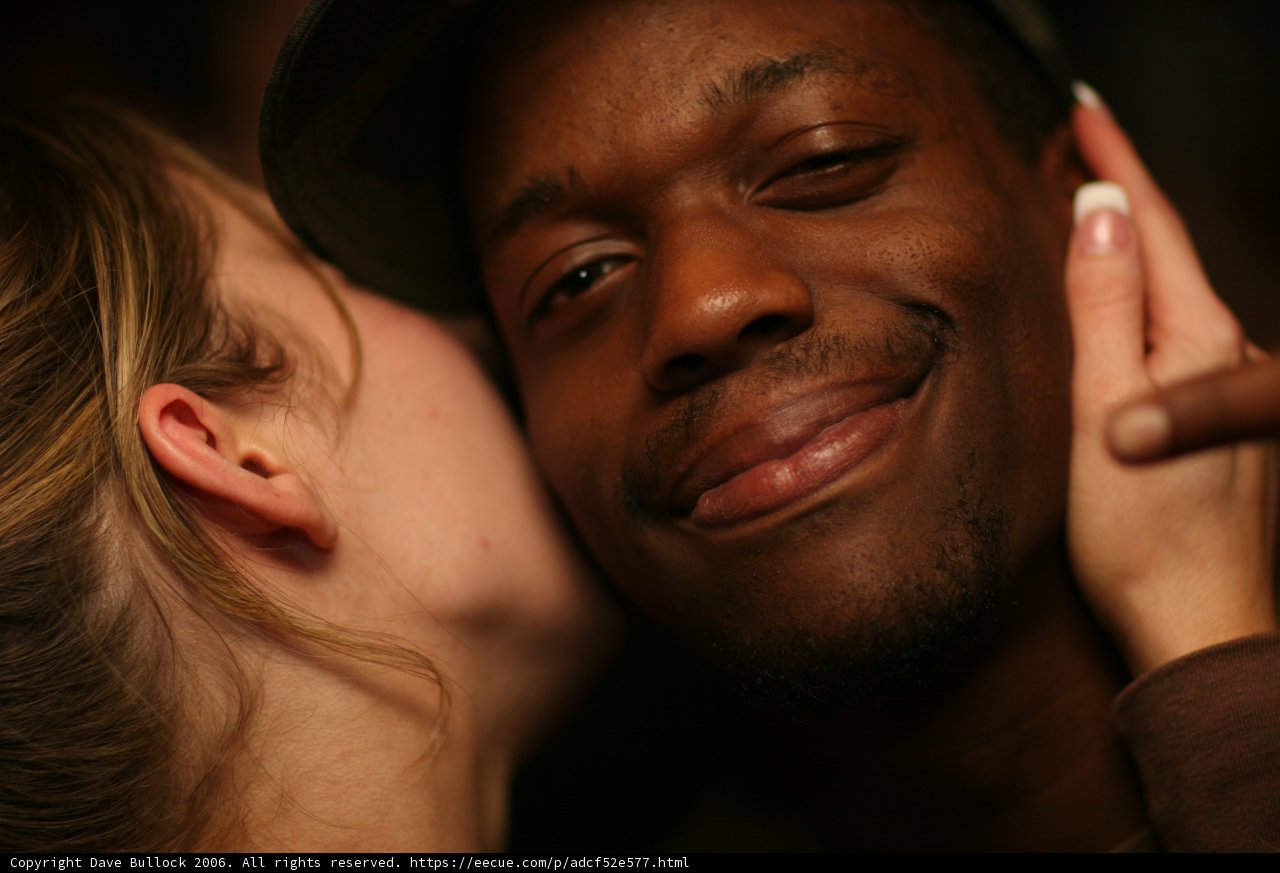 A Romantic Kiss Under the Hat
