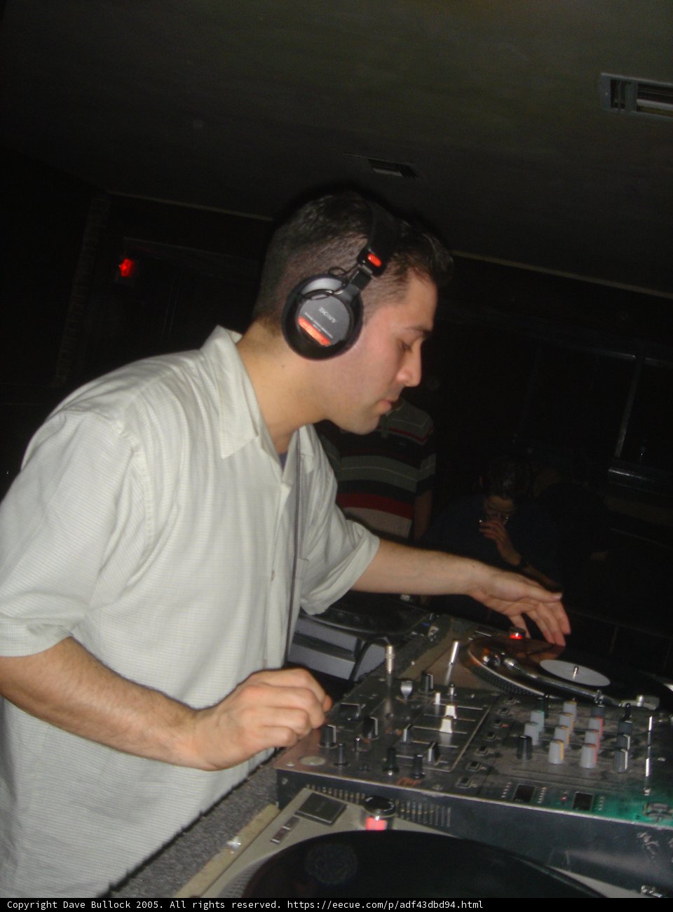 Clutch's DeeJay Entertaining the Crowd with His Turntable Skills
