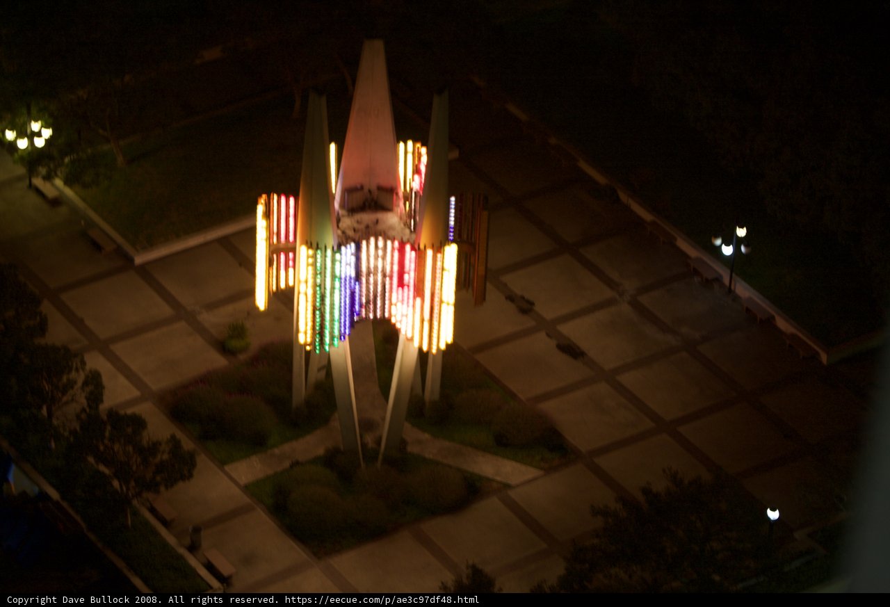 Illuminated Clock Tower in the Night Sky