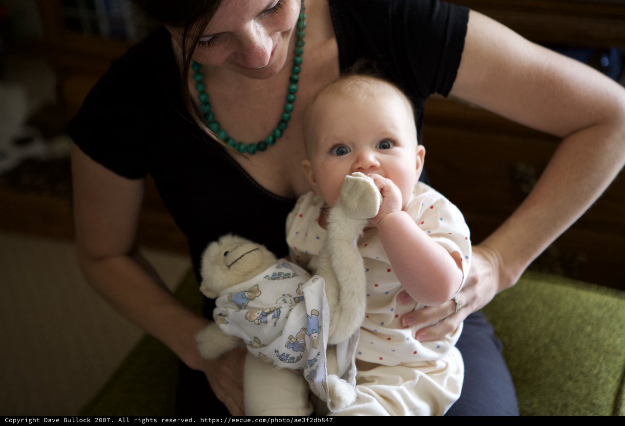 Mother and Baby Share a Tender Indoor Moment