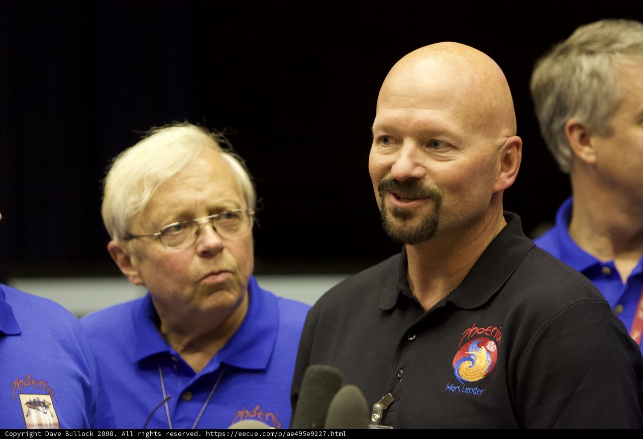 Post-Interview with Three Blue-Shirted Men and One Bearded Gentleman