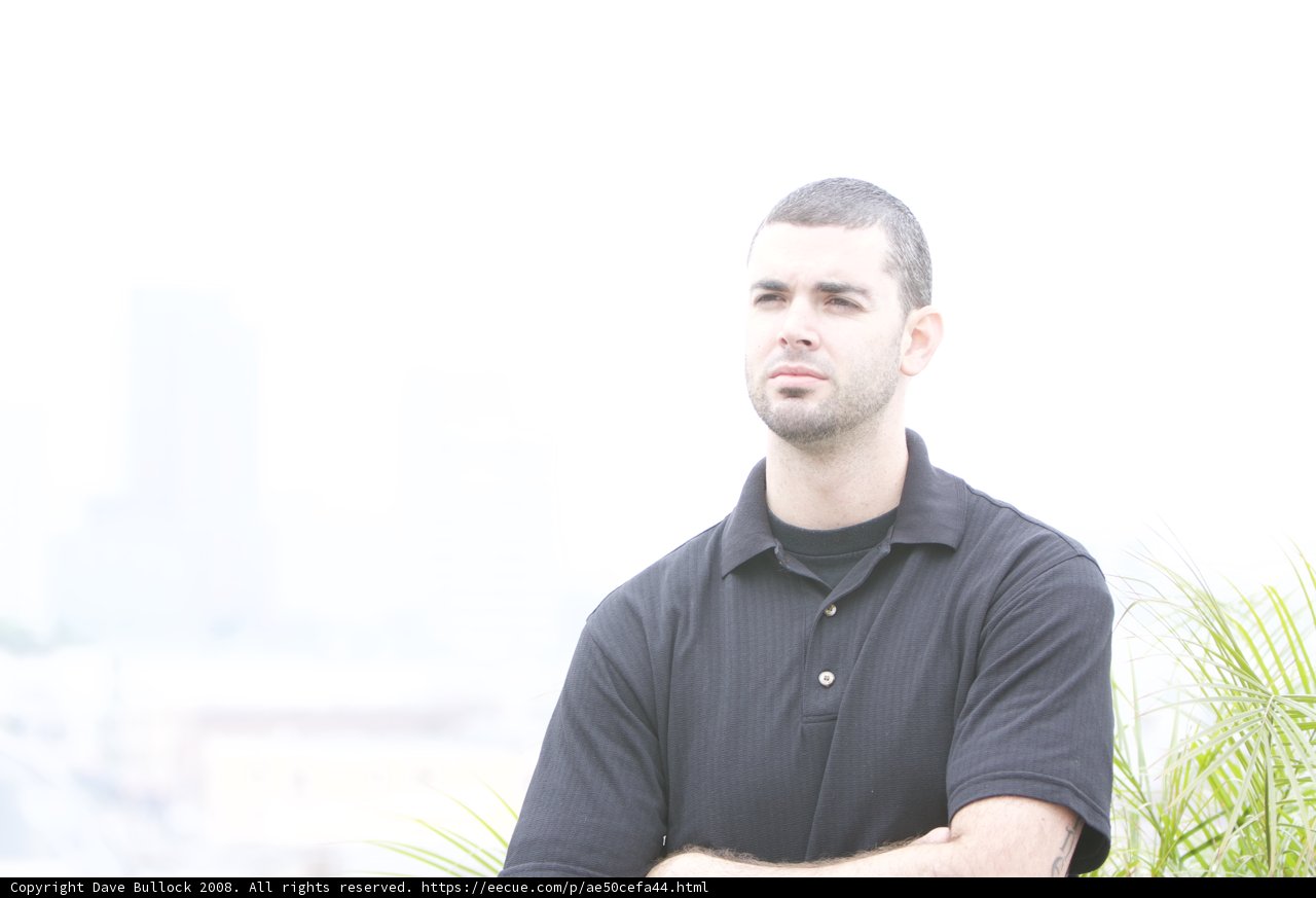 Dan B Smiling in Black T-Shirt
