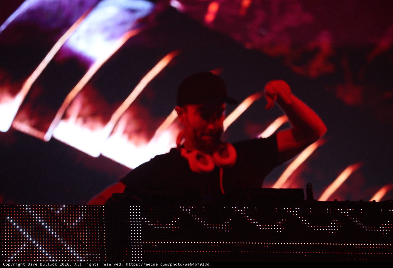 DJ Performs Under Red Lights at Wobbleland Festival