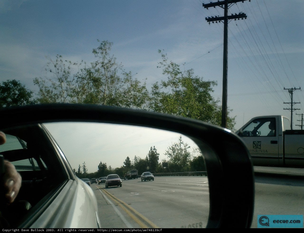 Reflection in the Car Mirror