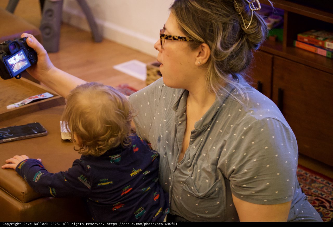 Mother and Child Capturing Christmas Morning Moments