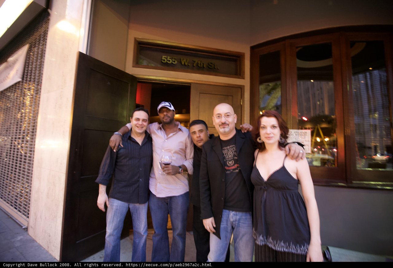 Gathering Outside the Wooden Door