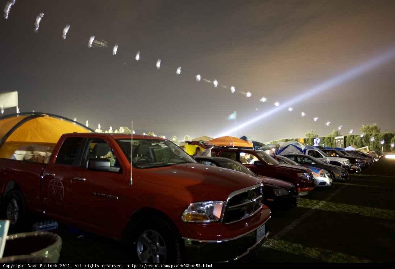 Red Pickup Truck and Tent in a Field at Coachella 2012