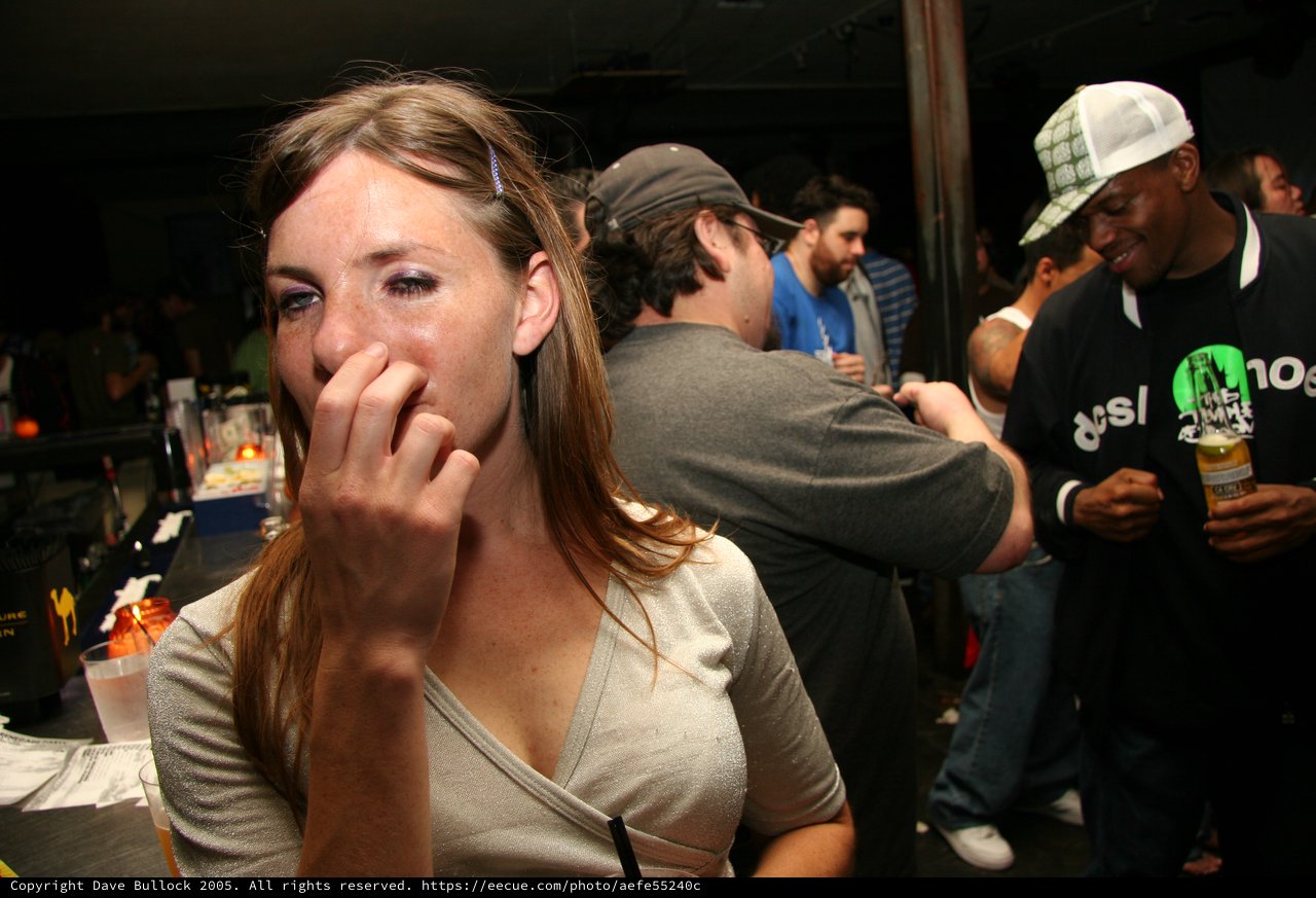 Emotional Woman at Crowded Nightclub Bar 2005