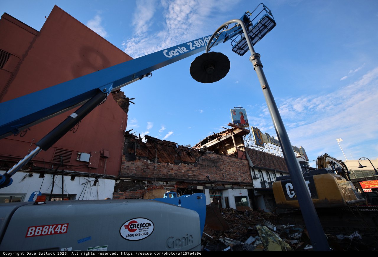 Demolition Site with Genie Crane at Dusk