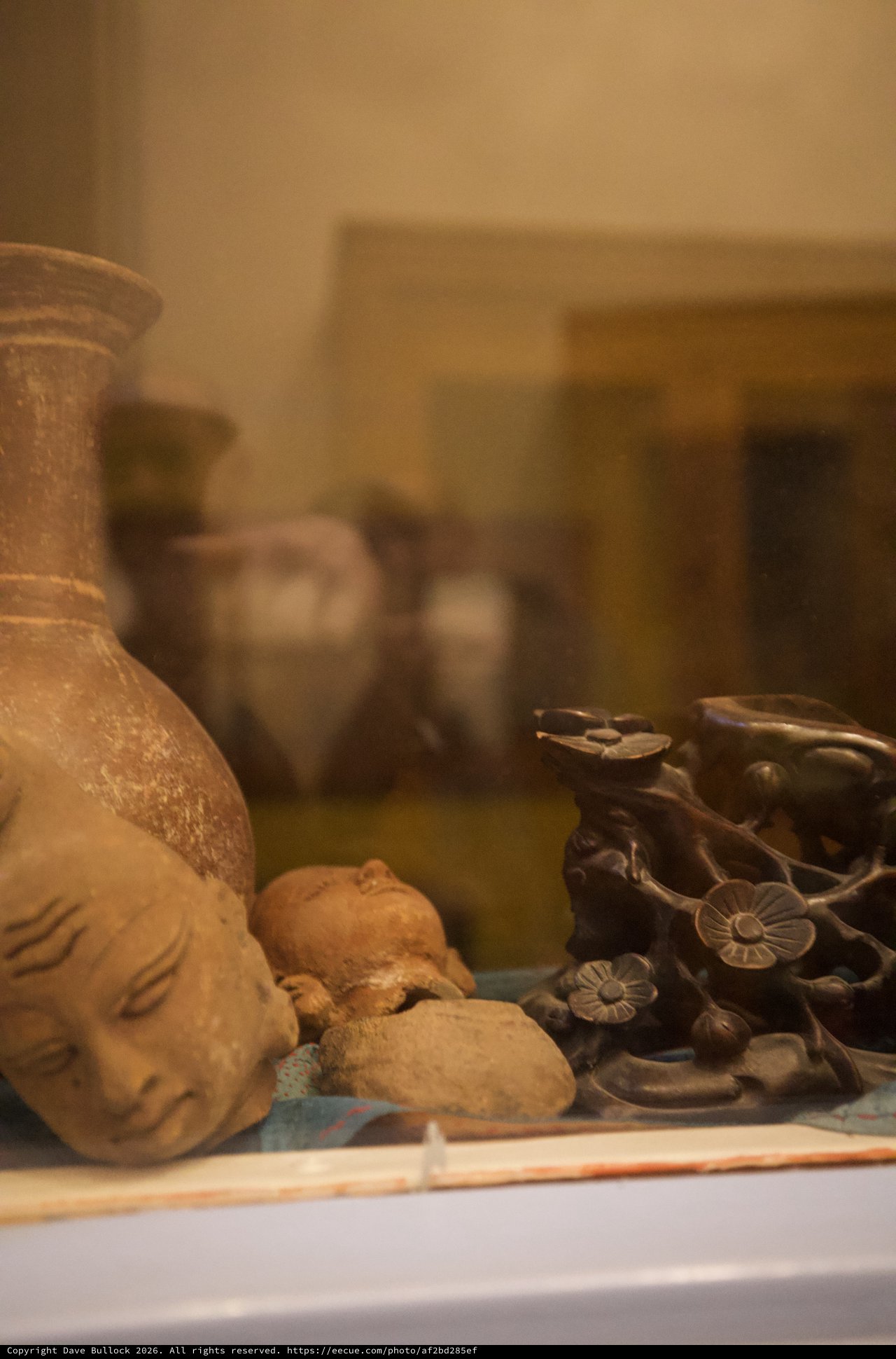 Tranquil Still Life with Buddha and Asian Ceramics