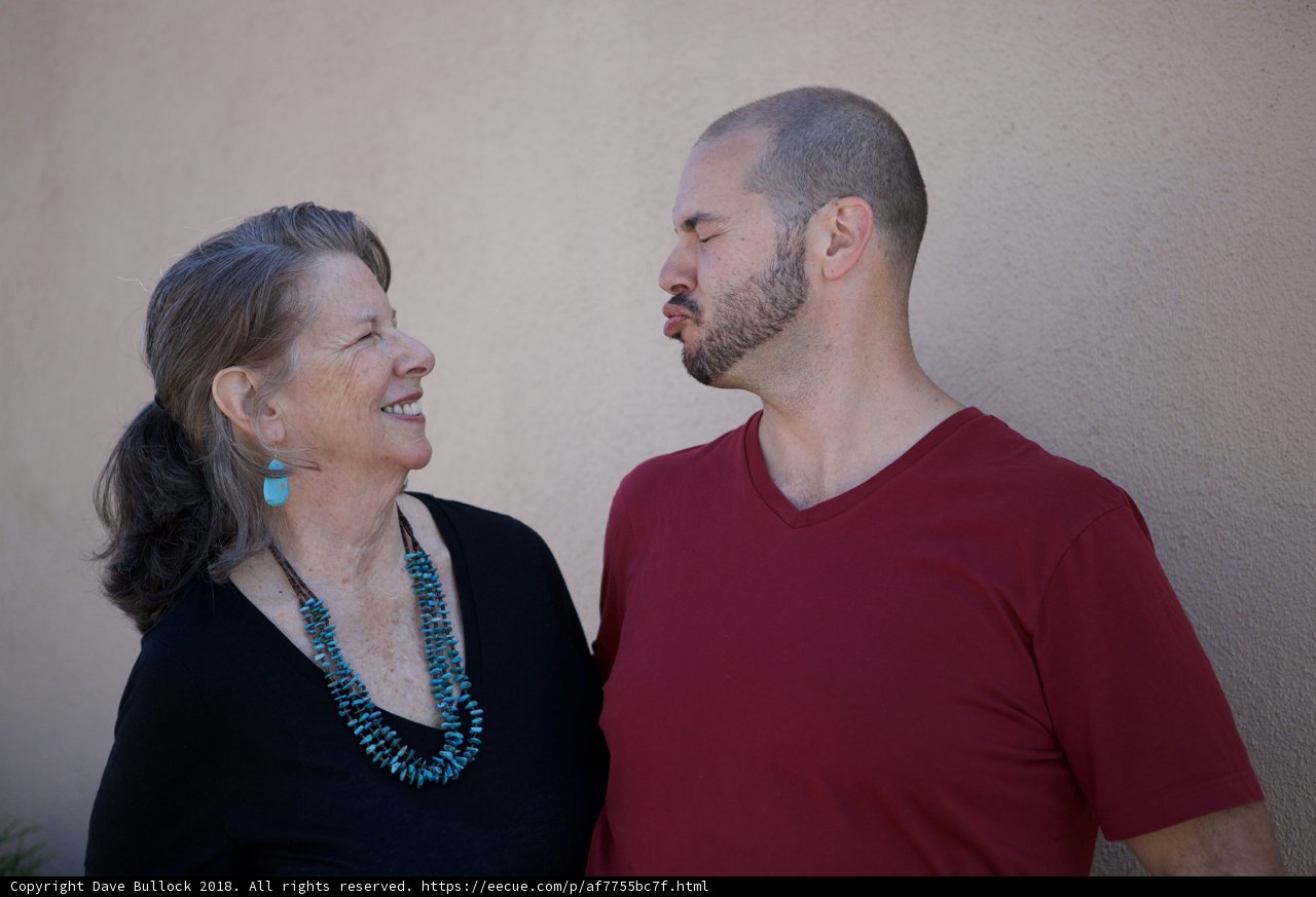 Smiling Couple Adorned in Jewelry