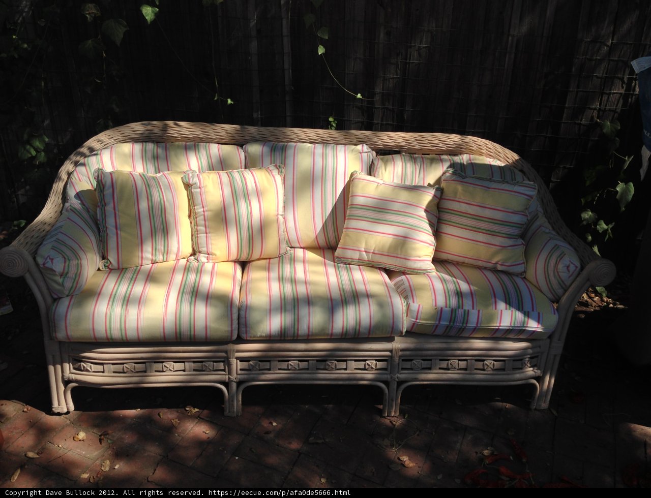 Colorful Couch on a Brick Patio