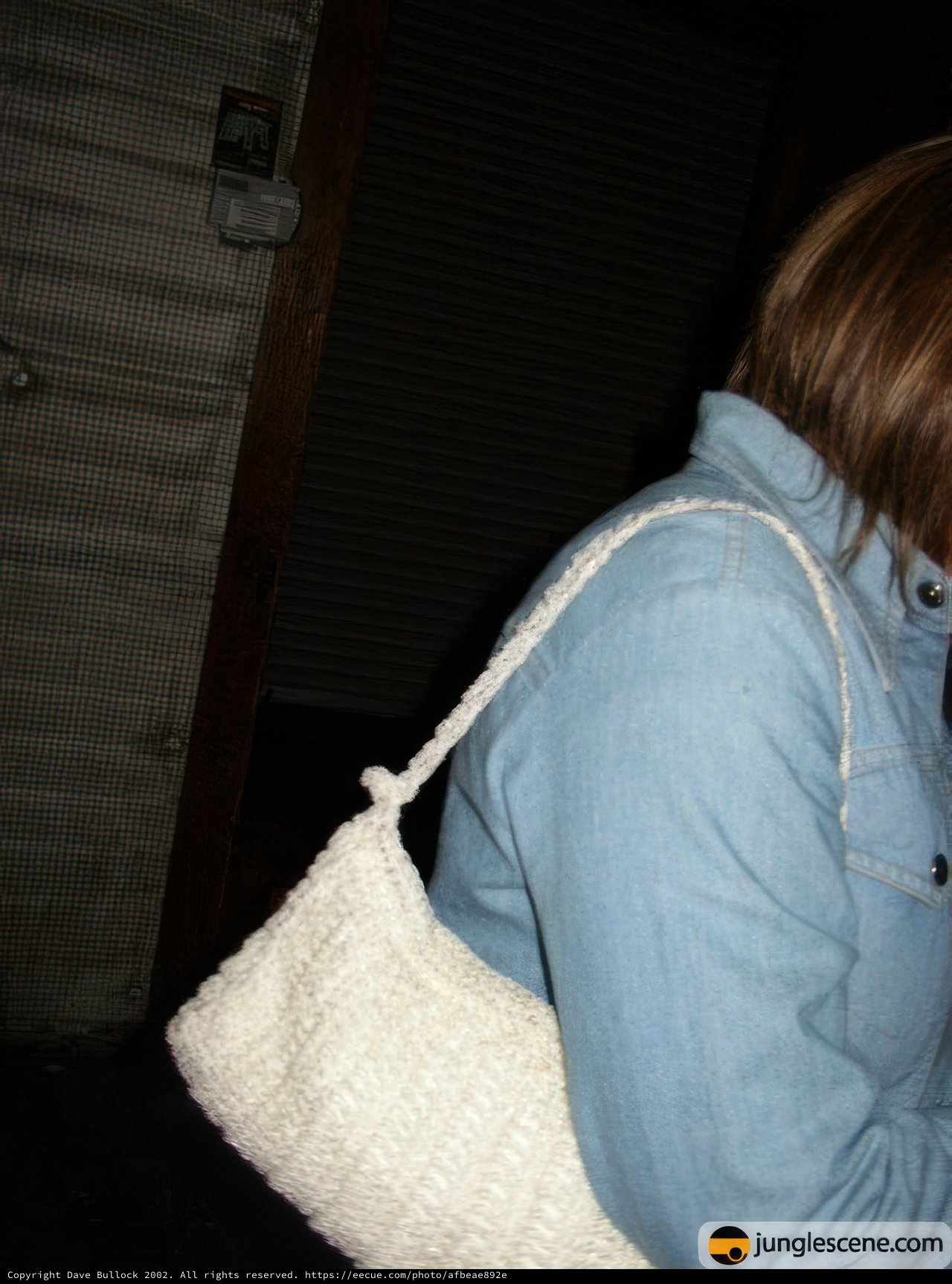 Blue Jacket and White Purse
