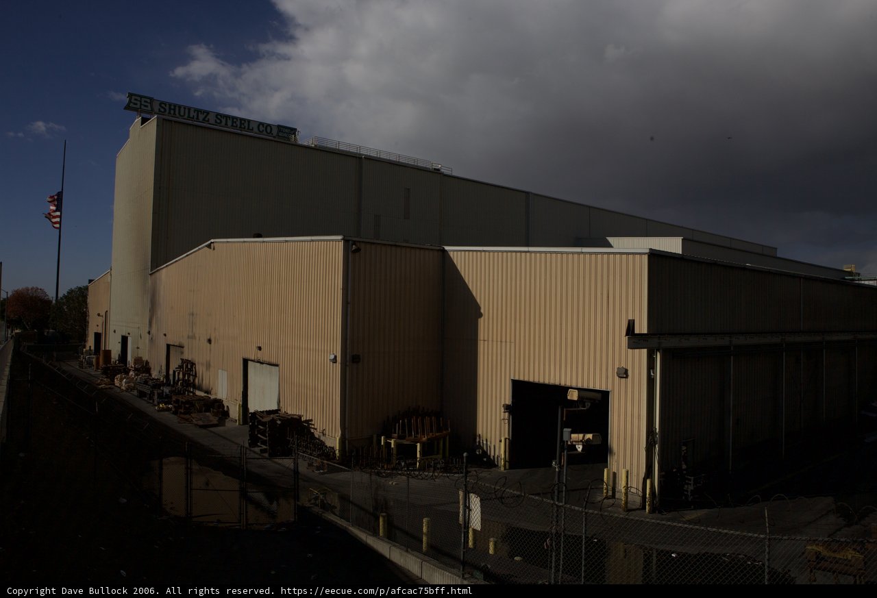 The Industrial Tower in the Cloudy Sky