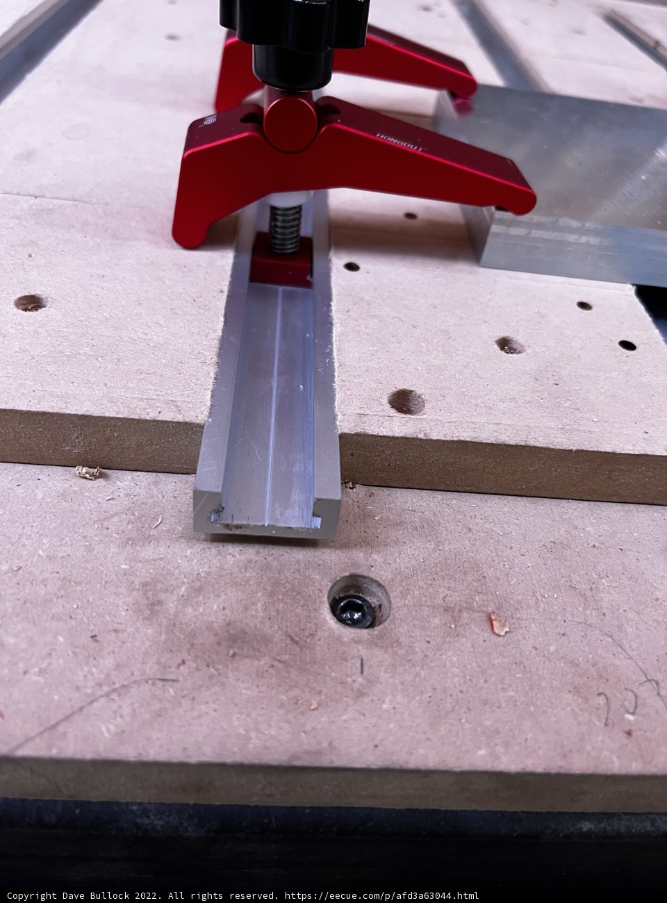 Red Clamp on Table Saw