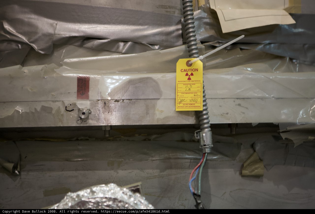 Warning signs in the metal wall
