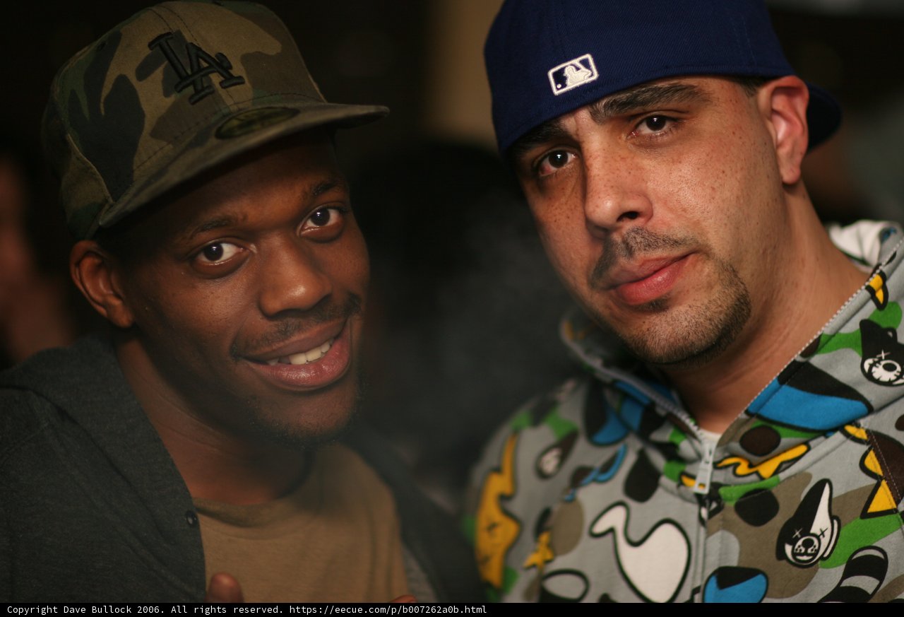 Two Men Sporting Their Caps
