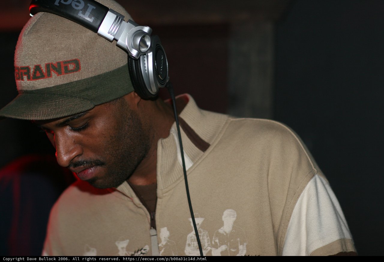 Brown-shirted Man with Baseball Cap