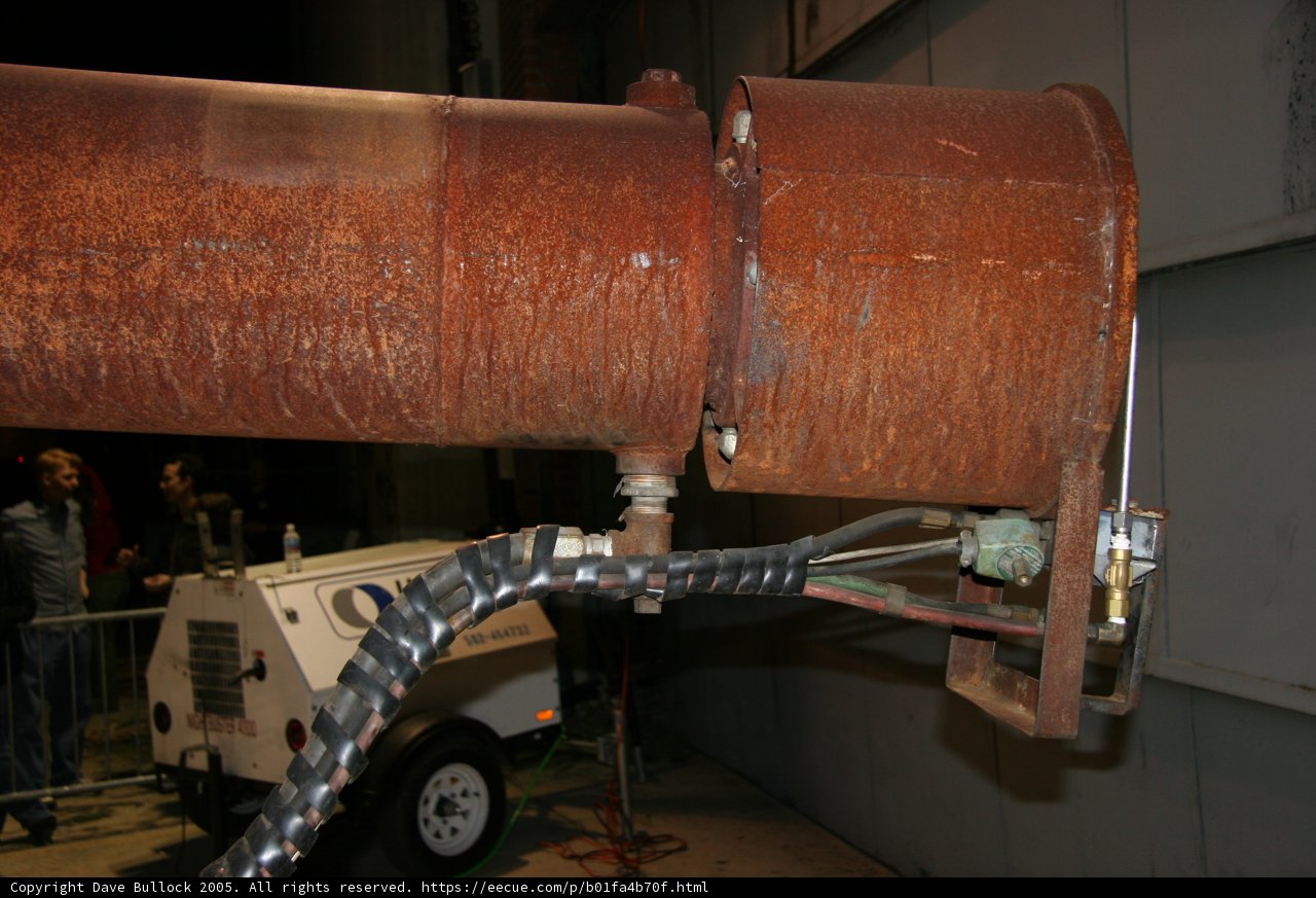 Rusty Pipe with Attached Hose