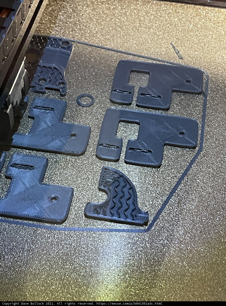 3D-Printed Metal Number with Symbol and Text