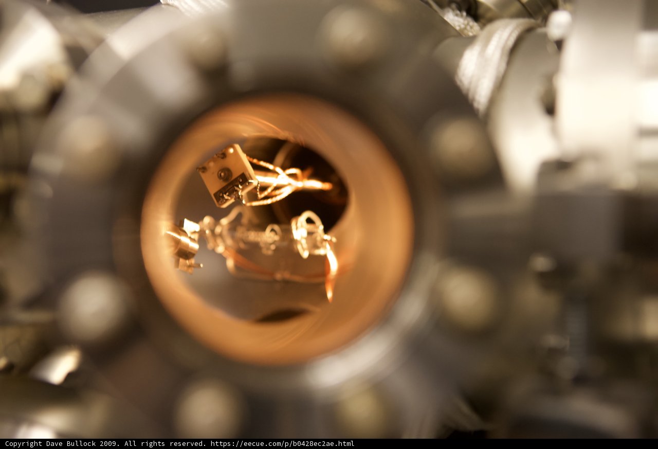 Fiery Alloy: A Close-Up of a Car Wheel Spoke