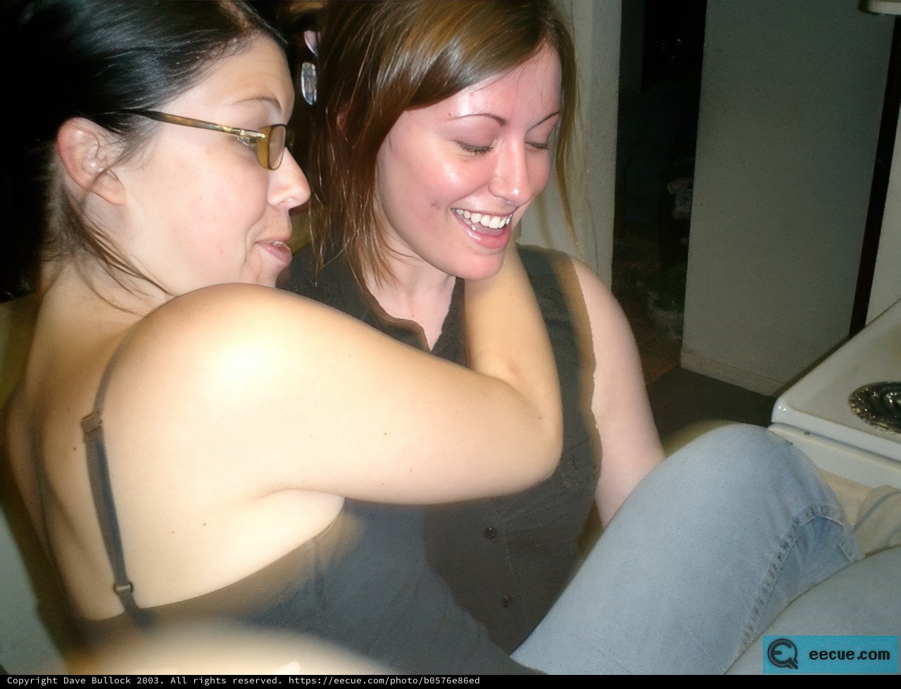 Two Friends Sharing a Warm Embrace
