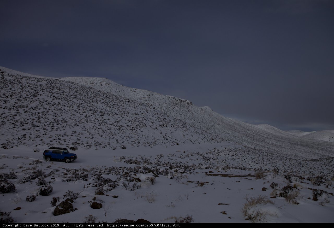 Blue Truck Braving the Winter Slope
