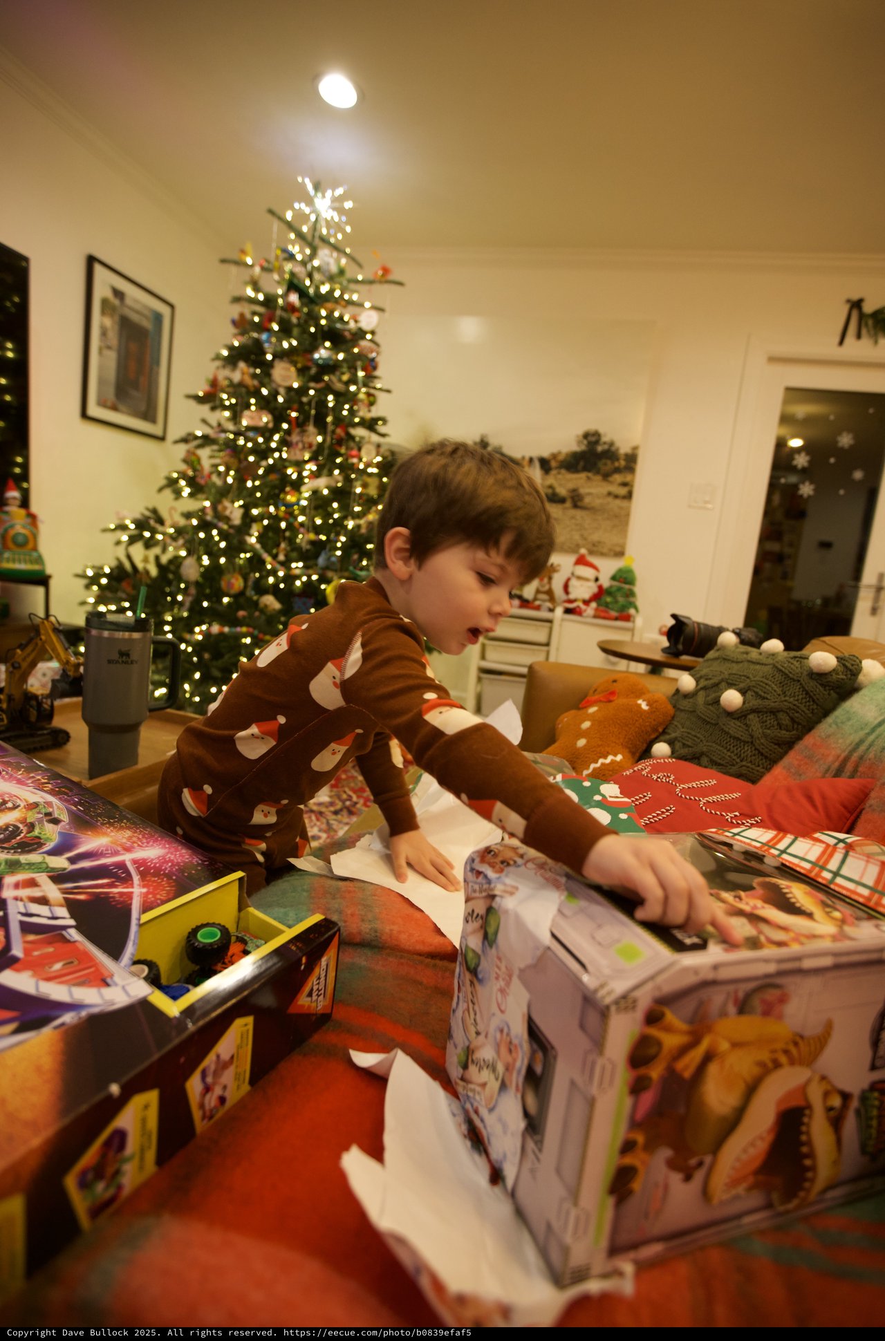 Christmas Morning Joy: Child Opening Presents