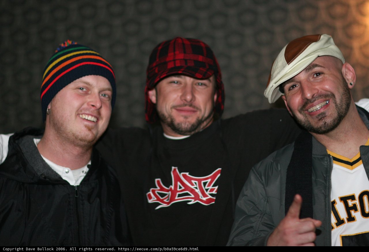 Three Men Strike a Pose