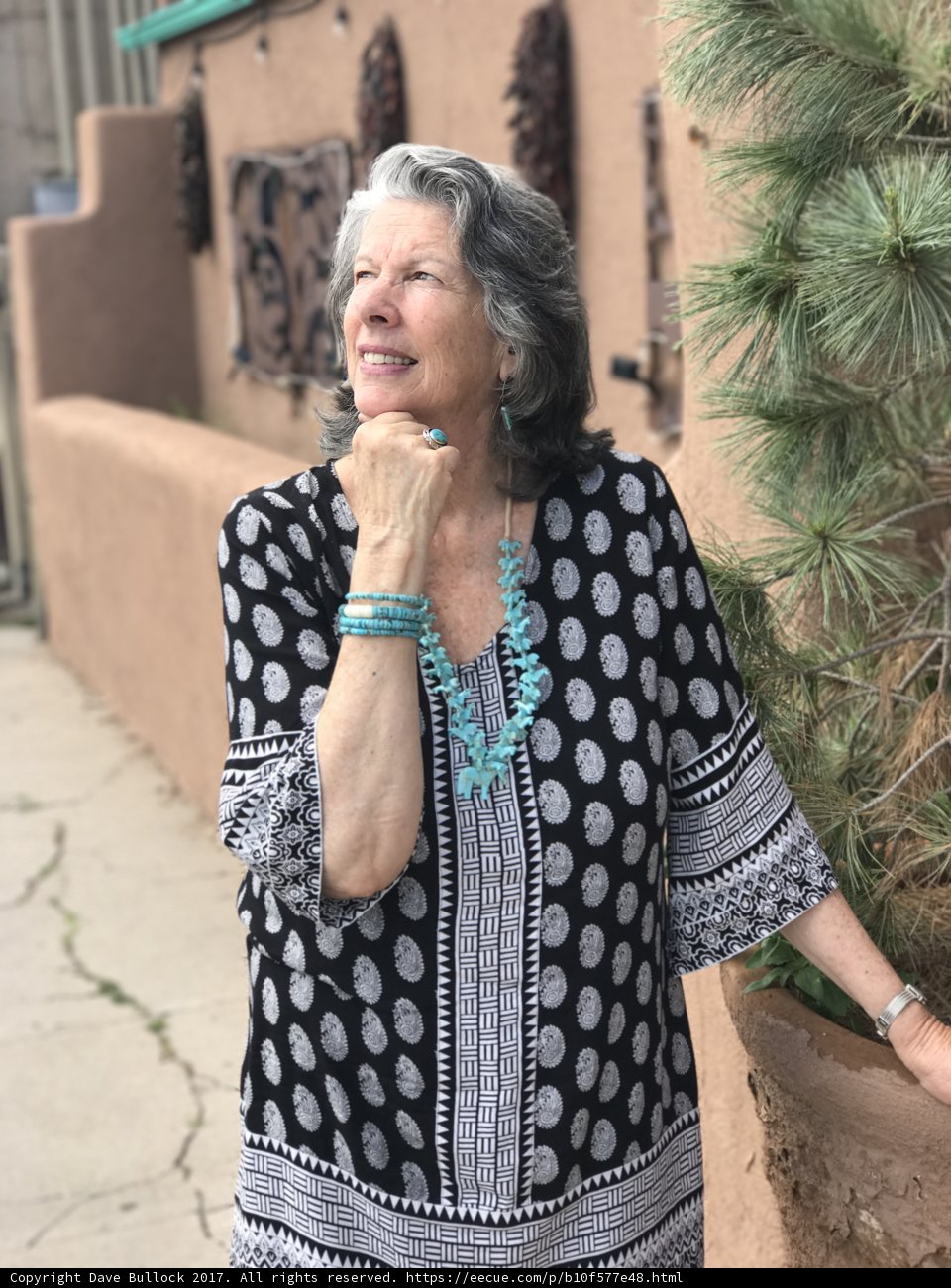 Polka-Dotted Lady Poses Among New Mexico Trees