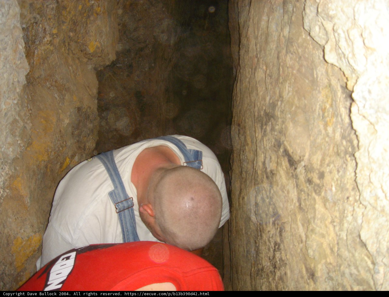 Red-shirted man exploring the Dungeon