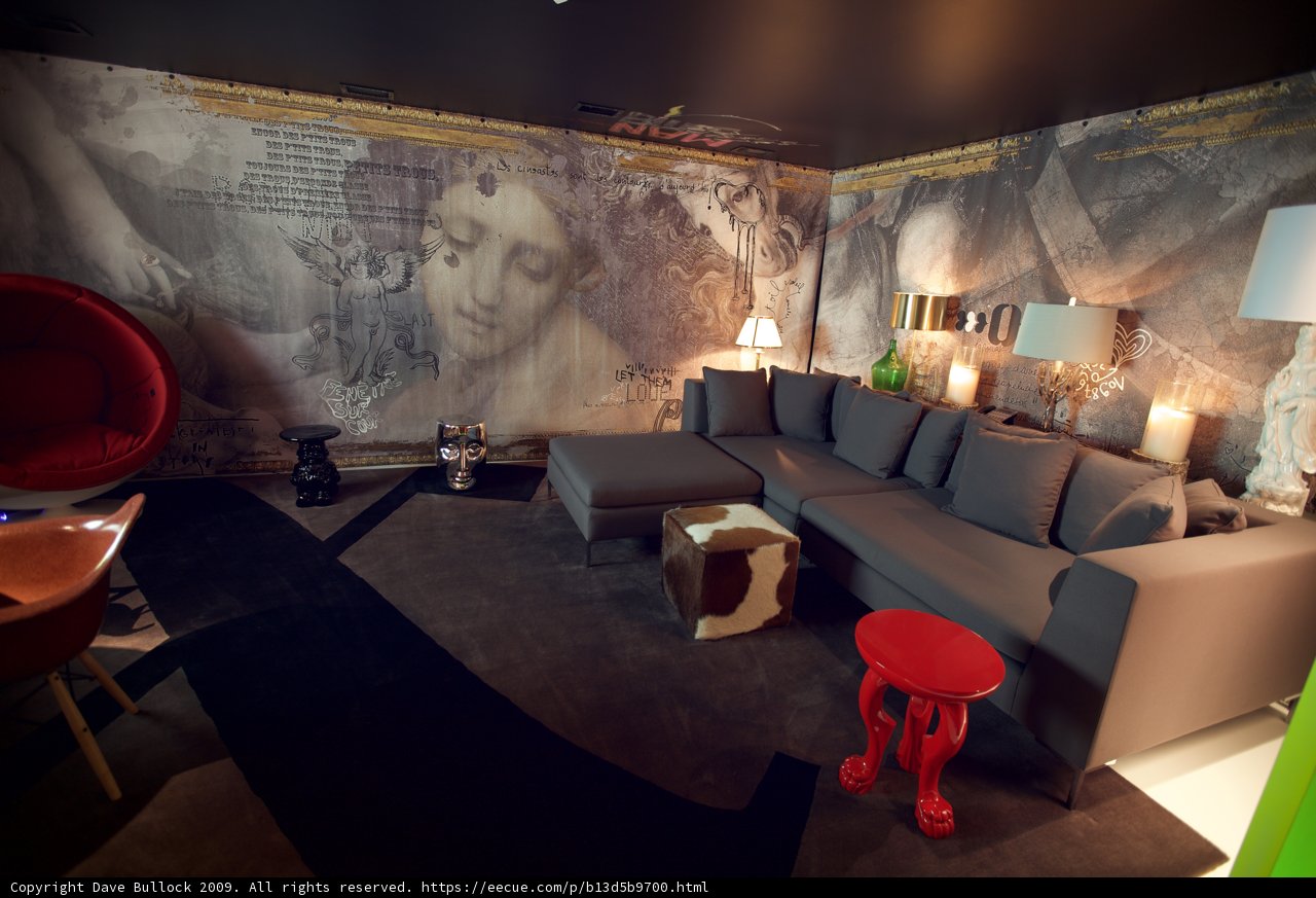A Cozy Living Room with a Wall Mural