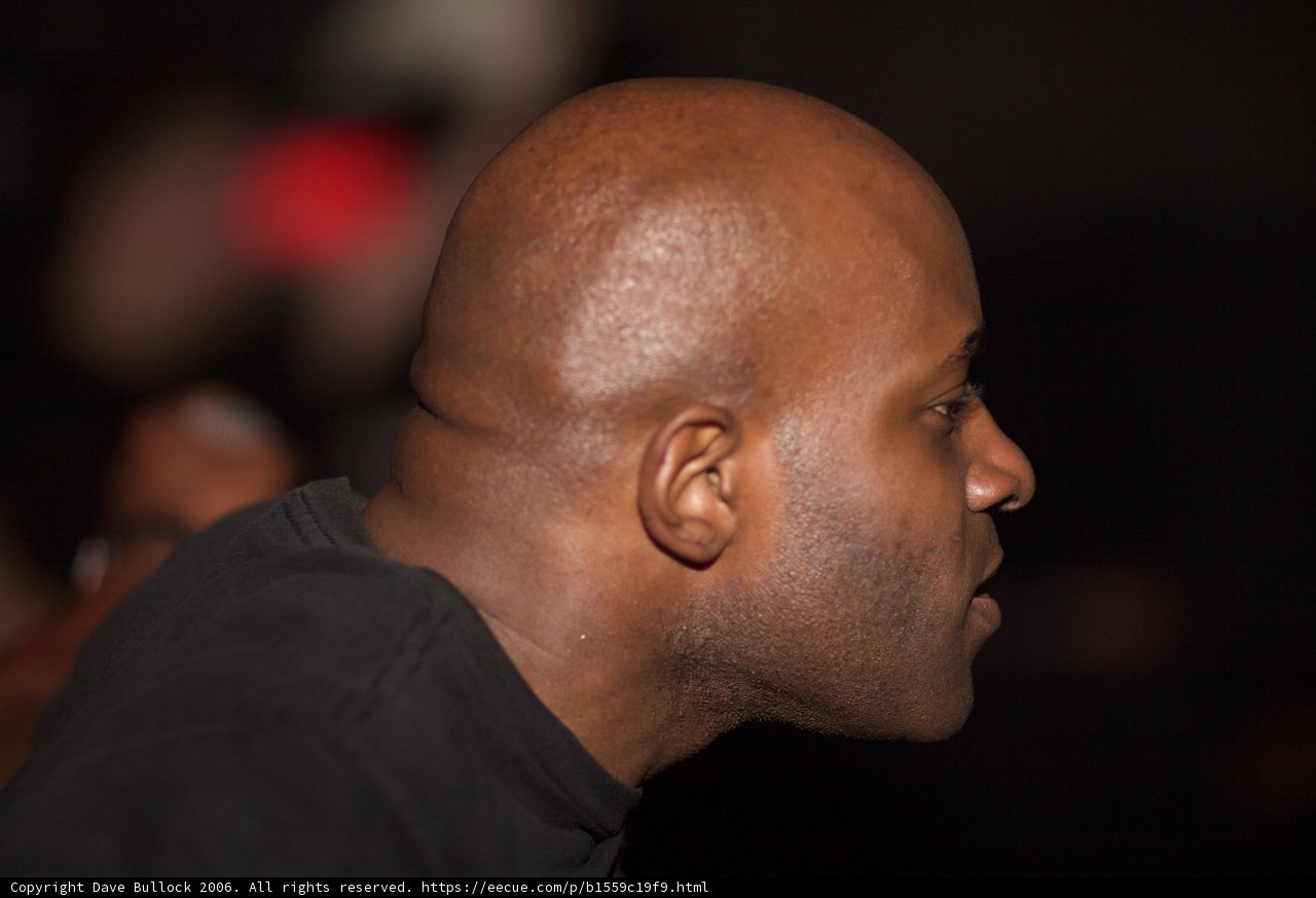 Headshot of MC Q