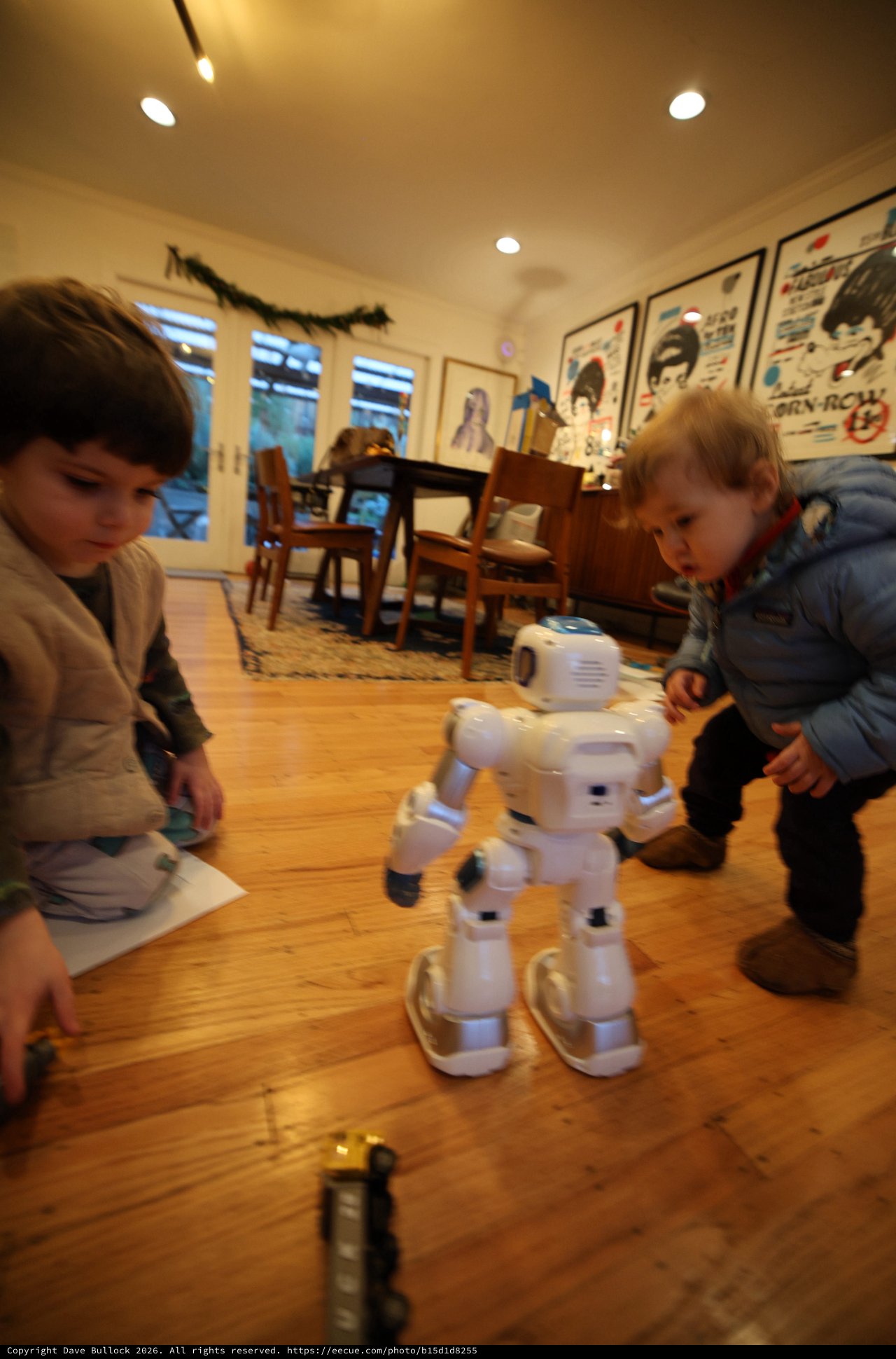 Children Discover Interactive White Robot at Home