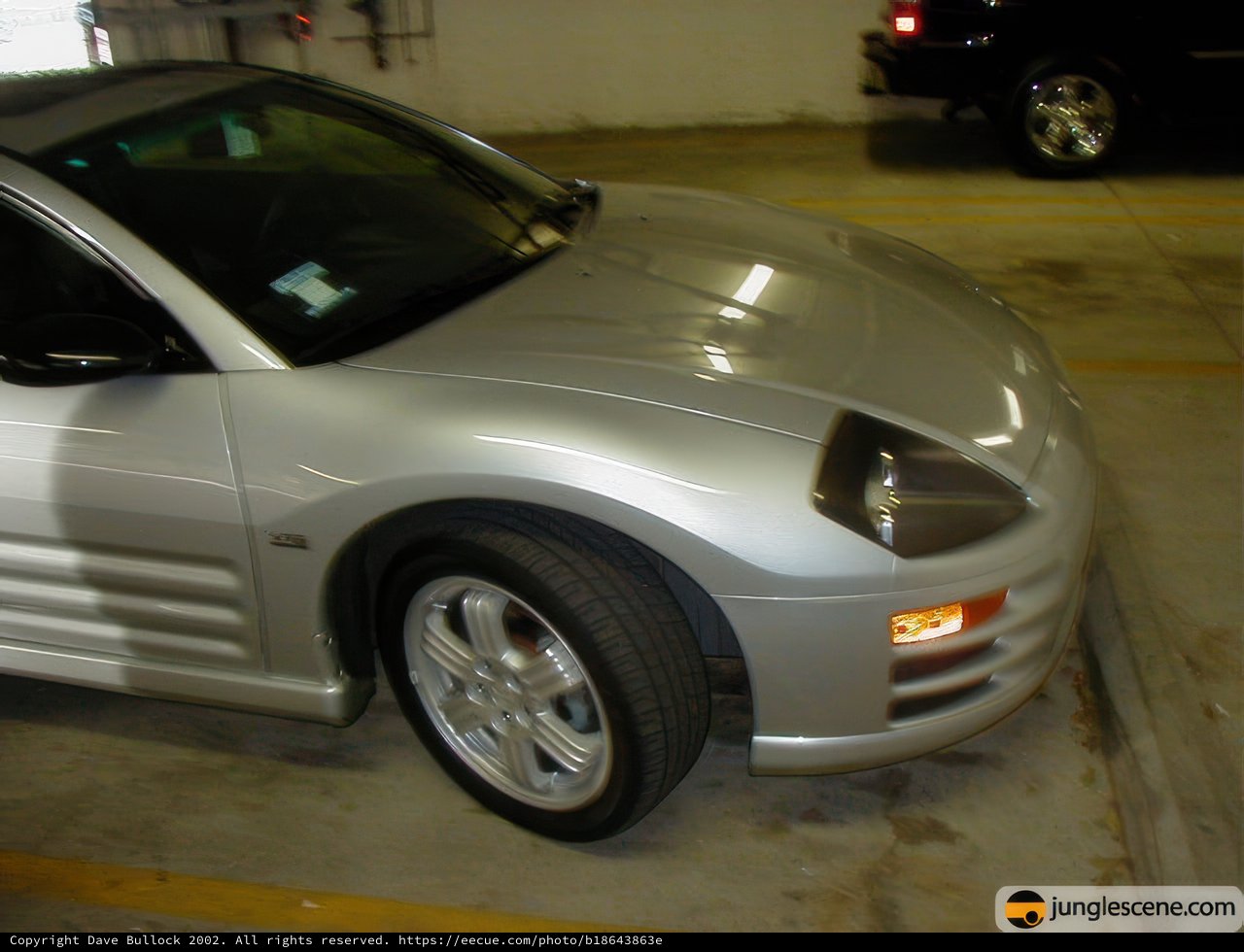 Parked Mustang Coupe in a Desert Parking Garage