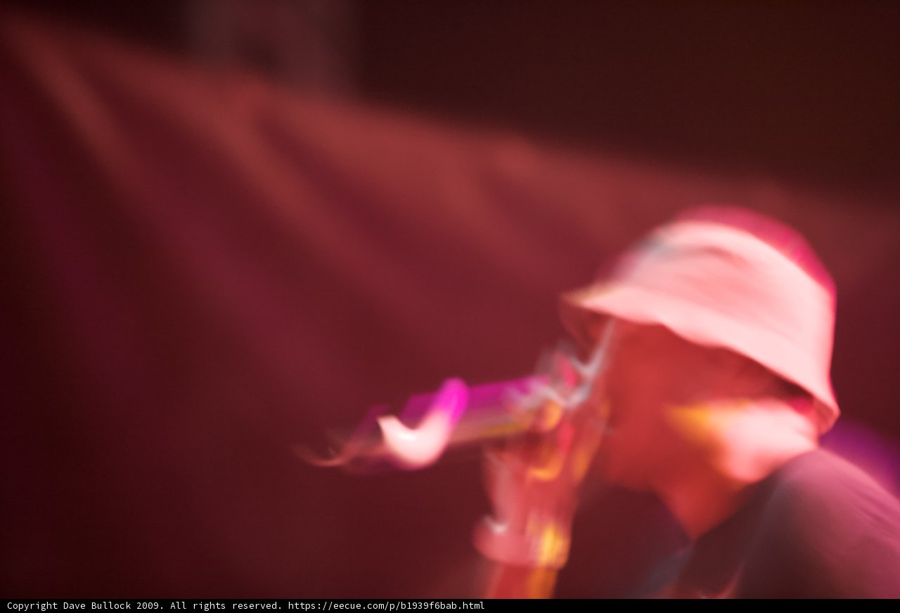 Hat-wearing man rocking out at Coachella
